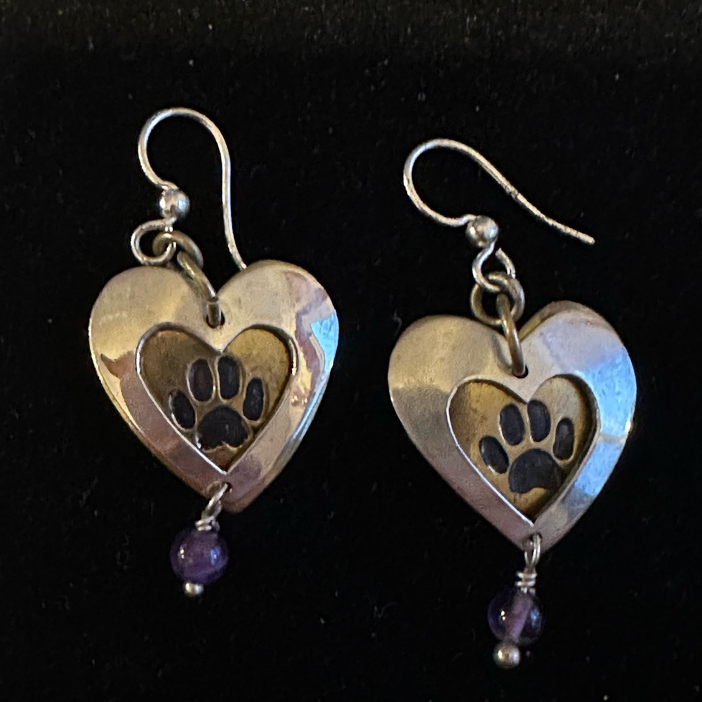 Two tone paw print earrings.